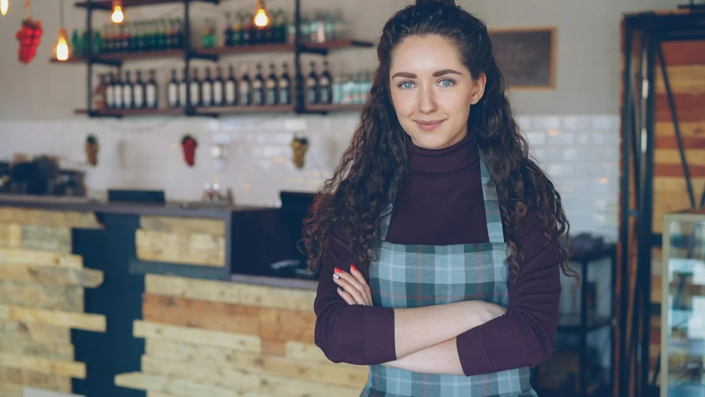 A business owner at her coffee shop